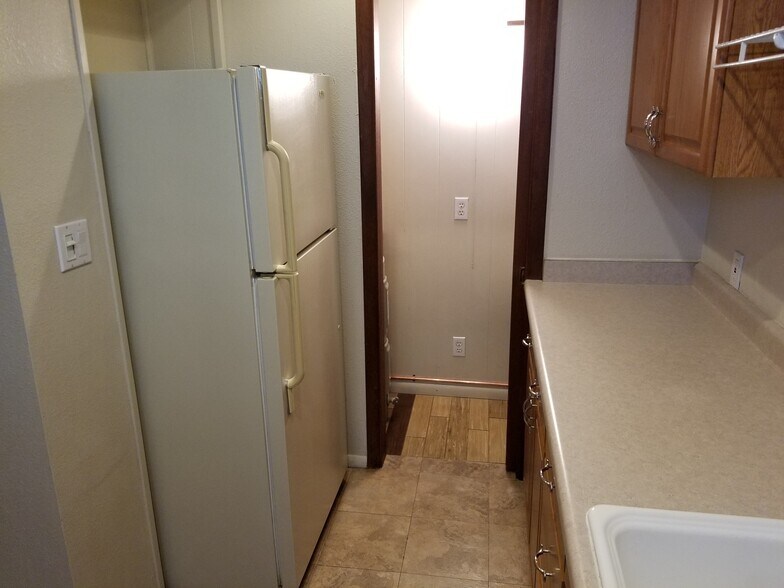 Kitchen Refrigerator and Pocket Door to Pantry - 922 E Coronado Rd