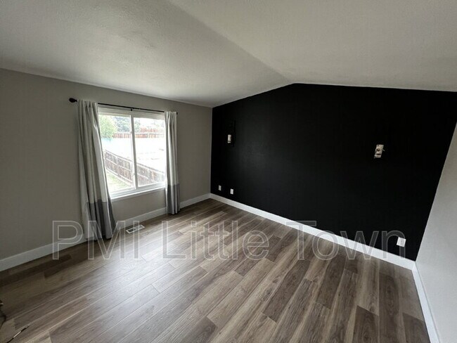 Building Photo - 8841 W Cooper Ave