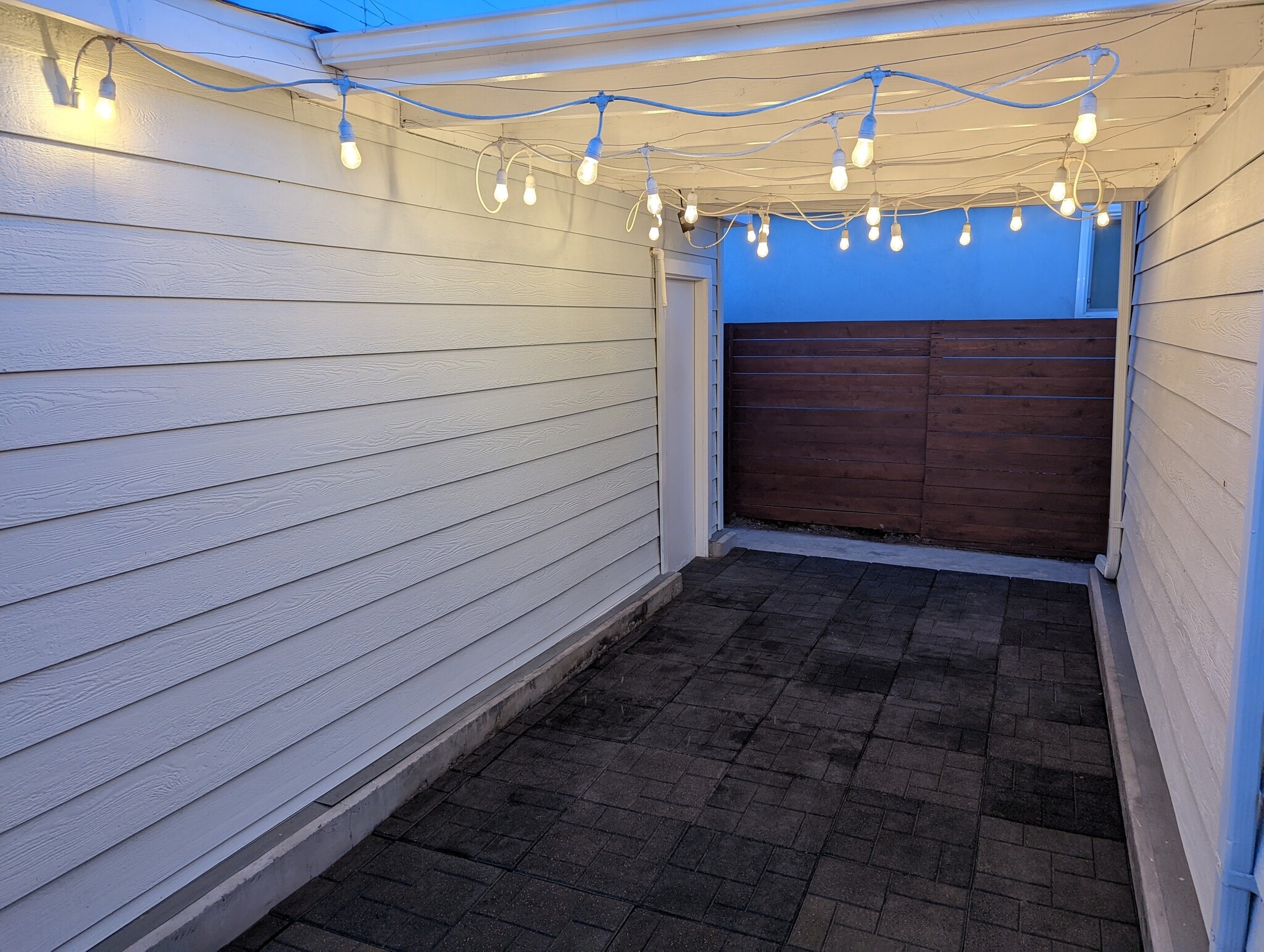 String lights illuminate the back patio, ready for your next BBQ! - 4828 Sawtelle Blvd