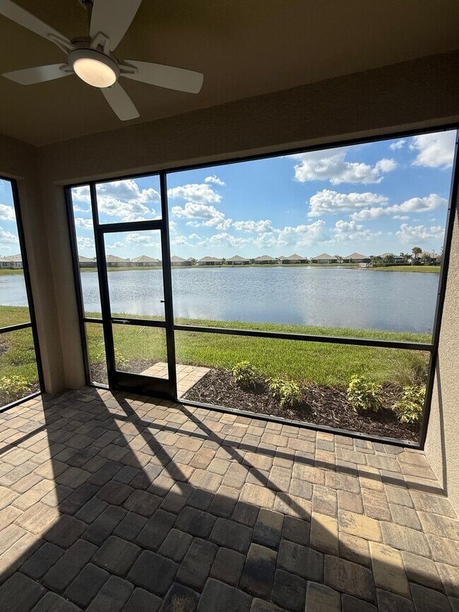Building Photo - 2BR 2BA Home w/ Quartz Island Kitchen + Pond View Lanai + 2-Car Garage in Lakewood Ranch