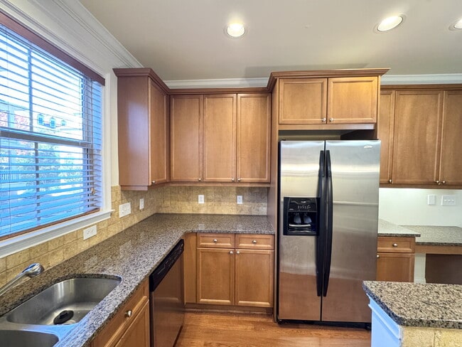 Building Photo - Modern 1-Bed Townhome Near Perimeter Mall — Gated, Bright, and Convenient!