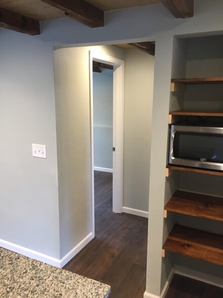 hallway from the living room towards the bedroom and bathroom - 431 N Franklin St