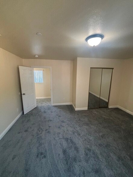 Building Photo - 1229 W 60th St