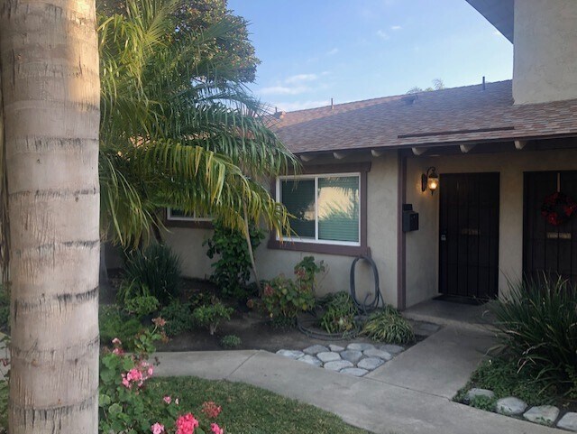 Tropical Landscaping to Entry - 16181 Ganges Lane #2, Huntington Beach, CA 92647