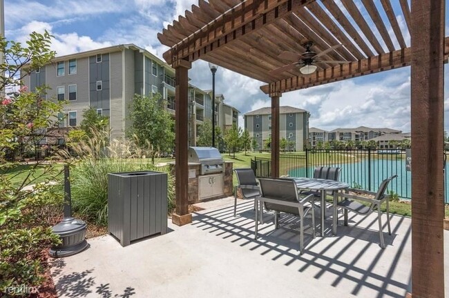 Building Photo - 1 br, 1 bath Condo - 7315 Spring Cypress R...