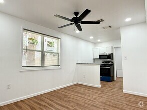 Building Photo - Unbeatable Location: Modern Living Steps f...