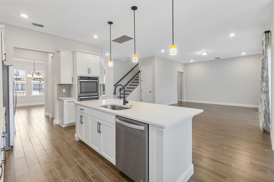 Kitchen looking over living room and dining. - 16753 Gullfloss Ter