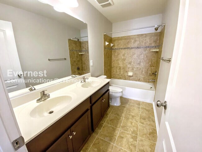 Building Photo - 5 Bed, 4.5 Bath Home with Fenced Yard & Garage / Coming Soon!