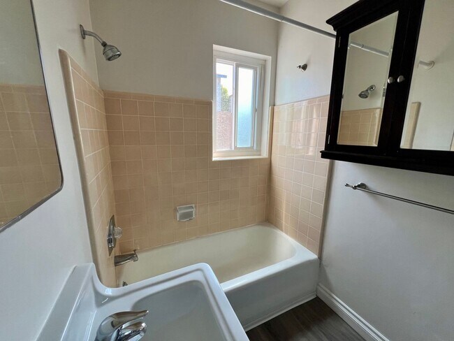 Building Photo - Pet Friendly Unit within Gated Community in North Park! COMPLIMENTARY Laundry! Street Parking Only!