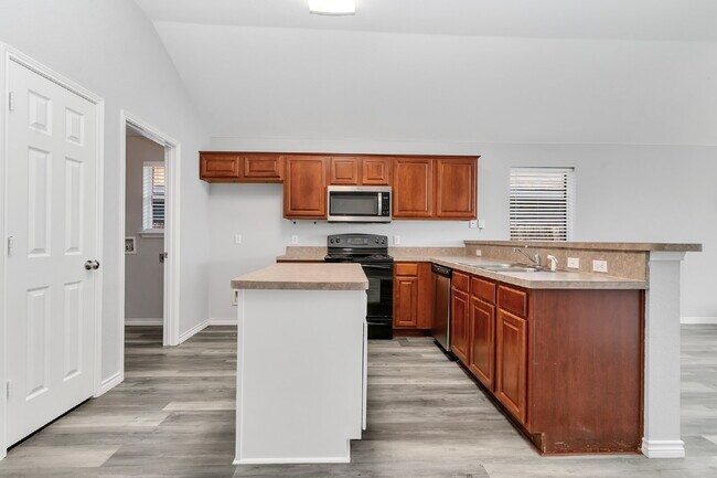 Building Photo - Welcome home to this beautifully maintained 4-bedroom, 2-bath, single-story home in the desirable...
