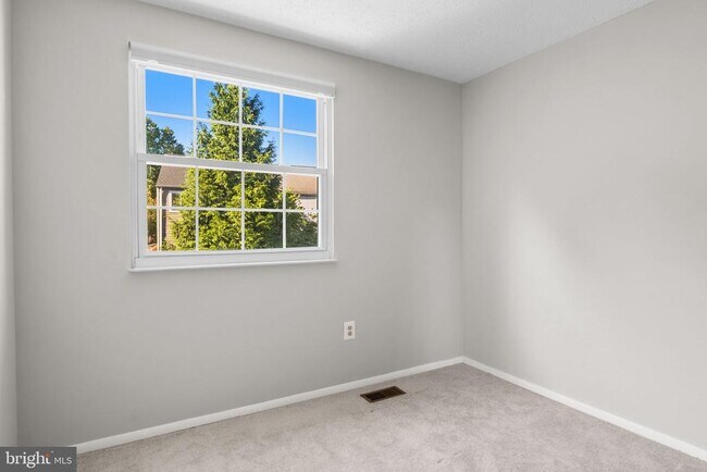 Building Photo - 7807 Breezy Down Terrace