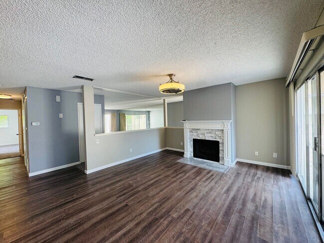 Building Photo - Don’t Judge the Outside—This 3BR Stuns Inside