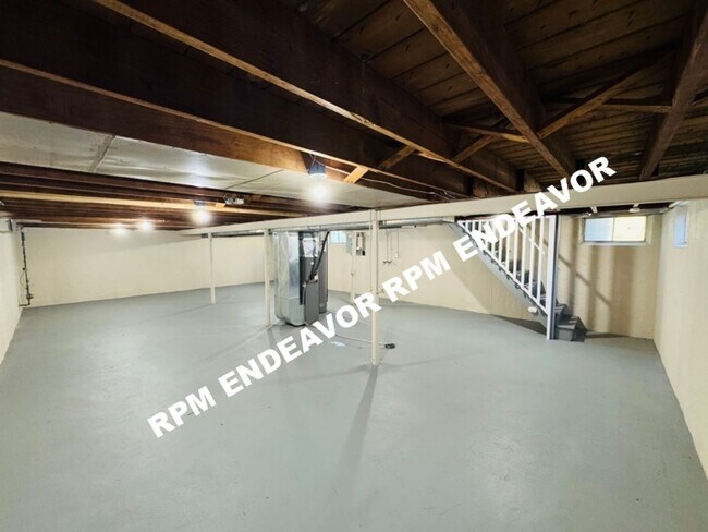 Building Photo - "Charming 4-Bedroom Haven with Sunroom, Ha...