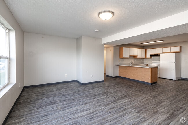 4BR, 2BA - 1,150SF - Living Room - Miller Avenue Estates