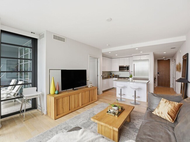 Building Photo - Designer-Furnished Waterfront Living at VIO Condominiums!
