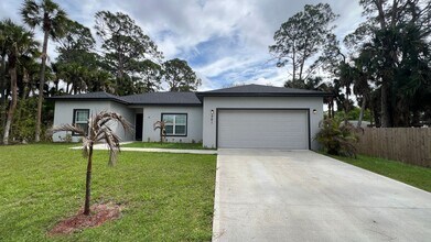 Building Photo - AWESOME 3 Bedroom, 2 Bathroom Home in Beautiful Palm Bay!!