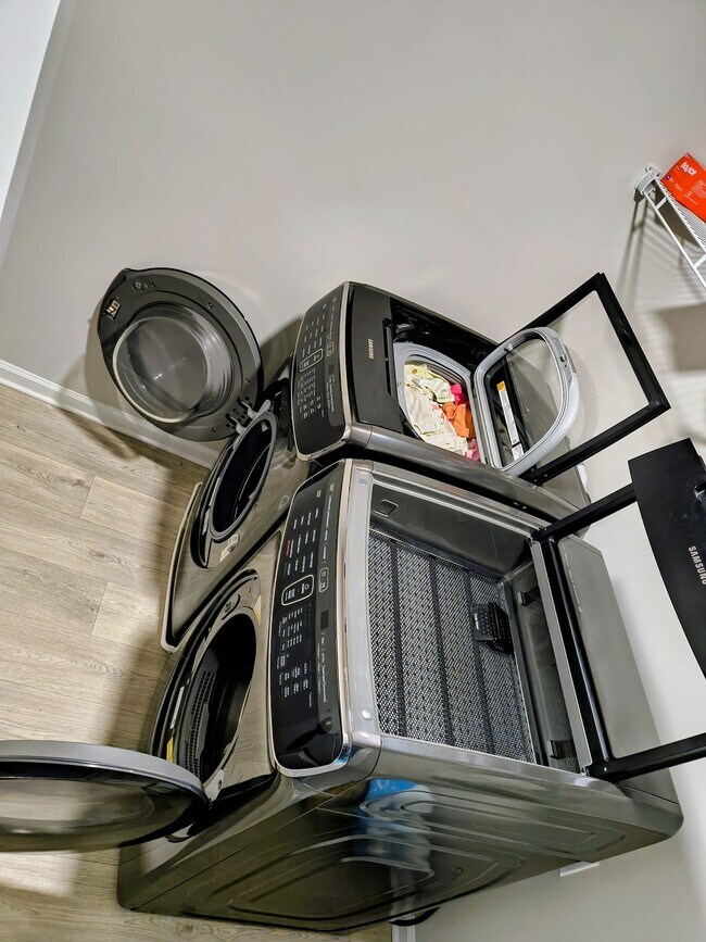 Laundry room with separate units for dirty and regular clothing - 166 Crest Brooke Dr