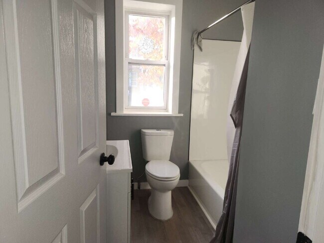 Building Photo - Charming & Spacious Updated Brick Home – P...