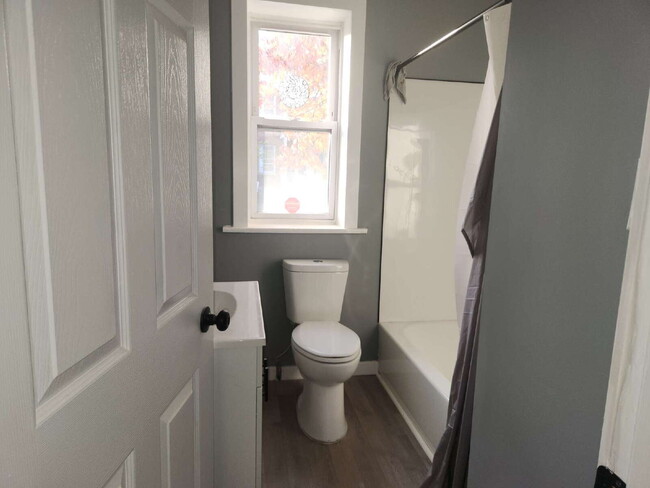 Building Photo - Charming & Spacious Updated Brick Home – Prime Location!