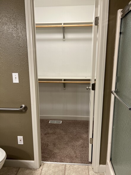 Master bedroom closet (upstairs) - 4701 Rainbow Trout Dr
