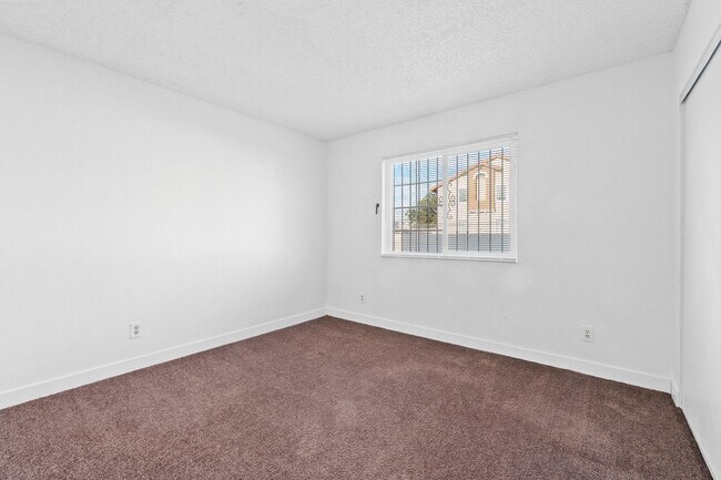Building Photo - Spacious 2-Bedroom Condo with Fireplace – ...