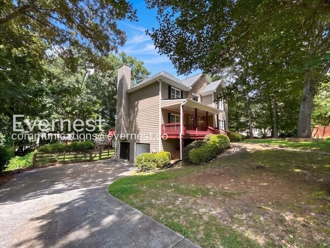 Building Photo - 4 Bed/2.5 Bath with Fenced Yard & Garage / Pet-Friendly
