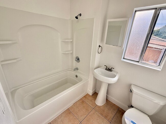 Building Photo - COMING SOON! Spacious 4 Bedroom, 3 Bathroom Home with Driveway