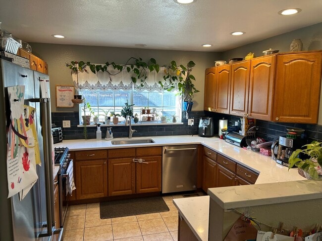 Building Photo - Rare 4BR End-Unit in Northpark with Finished Basement and 2-Car Garage