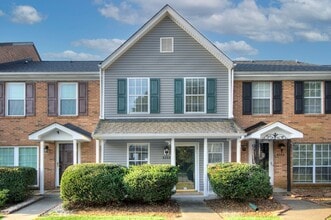 Building Photo - Discover this beautifully updated Raintree townhome featuring an open floor plan and a range of c...