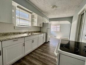 Building Photo - Spacious 2-Bedroom + Den Home with Ample Parking & Backyard!