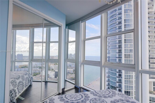 Building Photo - 18201 Collins Ave