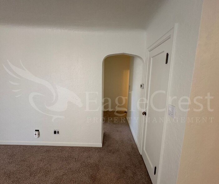 Building Photo - Three Bedroom, Two Bathroom House with Fenced Yard and Outdoor Fireplace