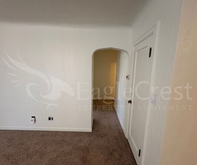 Building Photo - Three Bedroom, Two Bathroom House with Fenced Yard and Outdoor Fireplace