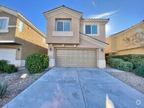 Building Photo - STUNNING 2 STORY HOME IN A GUARD GATED COM...