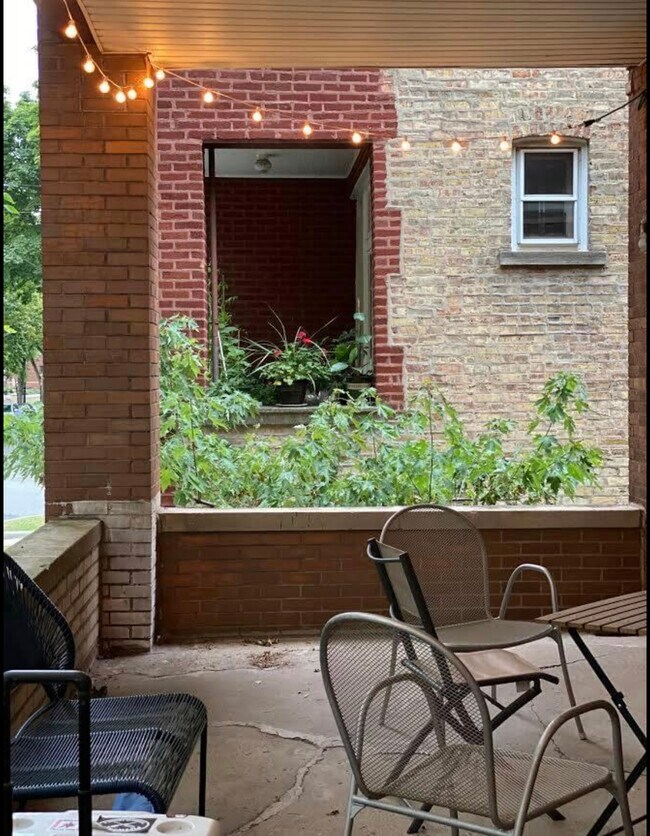 Half of the front porch. - 906 N Oakley Blvd