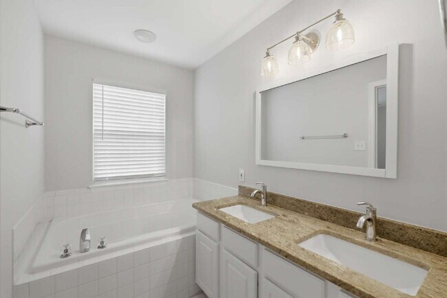 Building Photo - Elegant End-Unit Townhome with Exceptional Community Amenities