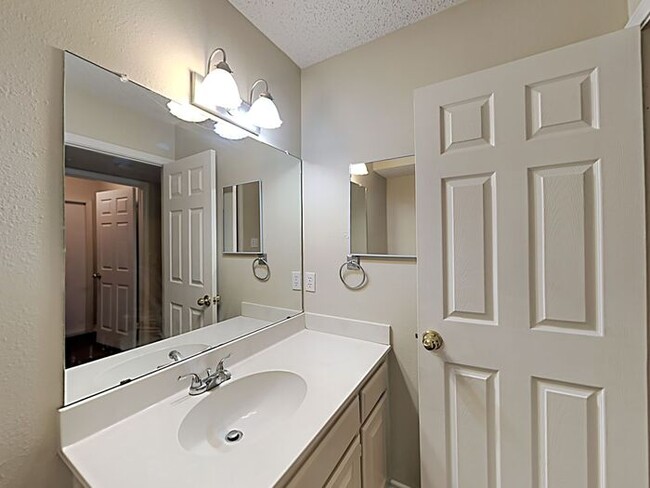 Building Photo - Move in before May 1st and get $1,000 OFF ...