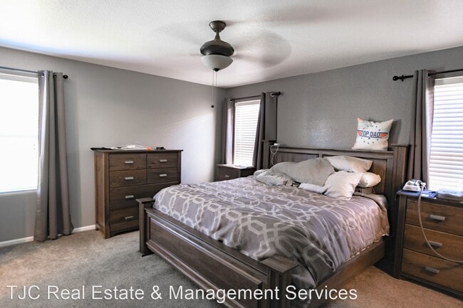 Building Photo - 4 br, 3 bath House - 6458 Trappers Trail Ave