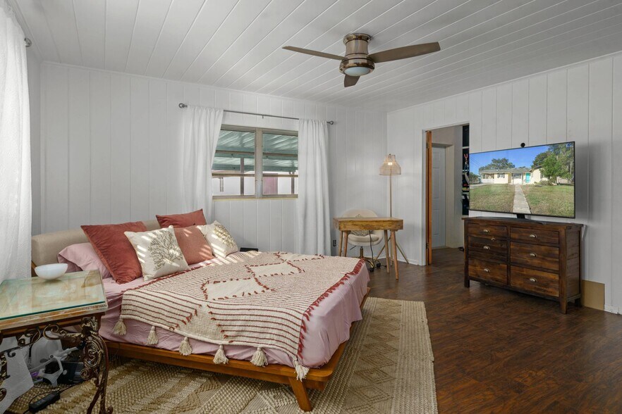 Master bedroom with private access to patio. - 117 Trout Ave