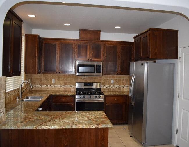 Building Photo - Great home with solar, centrally located n...