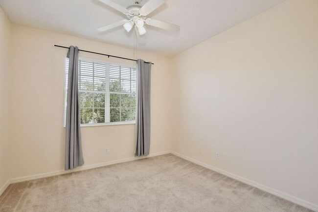 Building Photo - Beautiful 2/2.5 Cozy Townhome with a 1 Car Garage in the Gated Community of Victoria Pines - Orlando