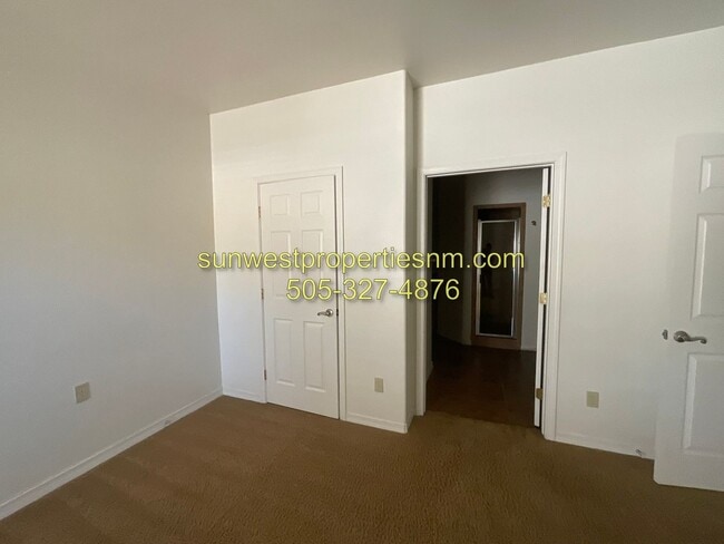 Building Photo - 3 Bedroom, 2 Bathroom Condo with 2 Car Gar...