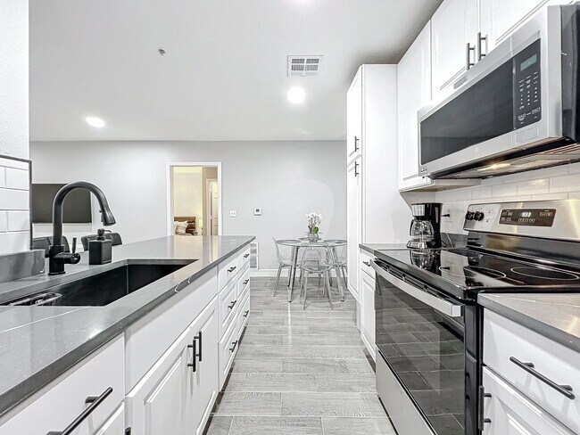 Building Photo - South Kirkman Road, Orlando, FL 32811 - 2 BR 2 BA condo