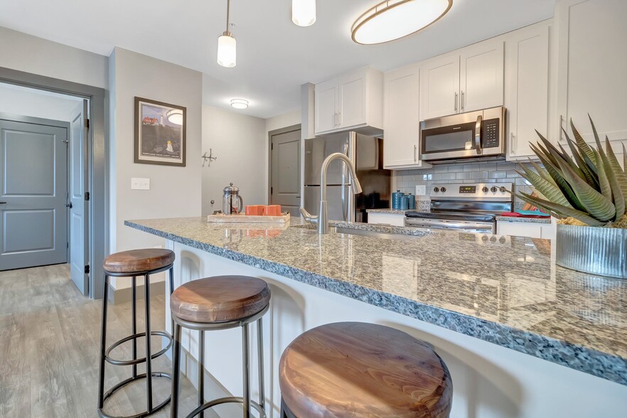 Kitchen wit White Shaker Cabinets - Latitude at South Portland