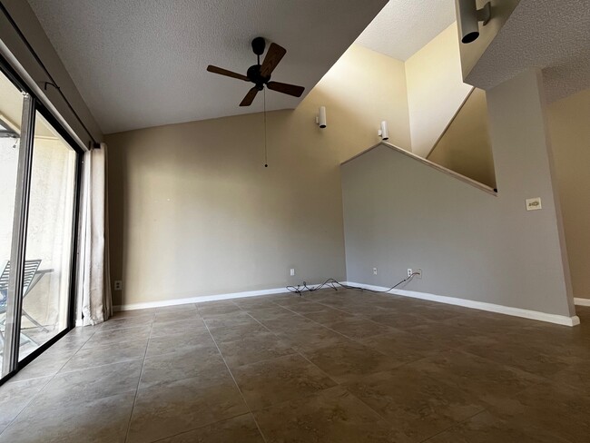 Living room with large tiles - 1694 SW Crossing Cir