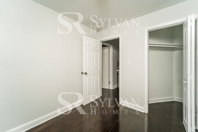 Building Photo - The living is easy in this 4 bedroom, 2 bathroom townhome