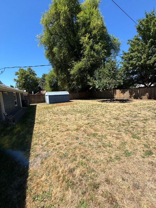 Building Photo - Charming Updated 2 Bedroom Home with Huge Backyard, A/C & Owner-Paid Landscaping
