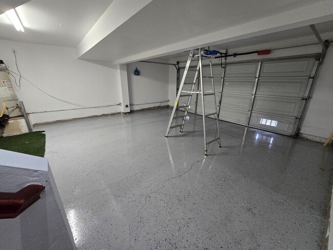 Building Photo - Beautifully Remodeled Tri Story Home located in a Gated Community ...