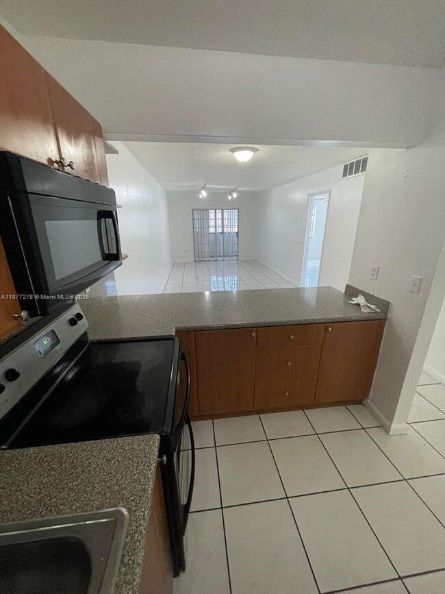 Building Photo - 6095 W 19th Ave