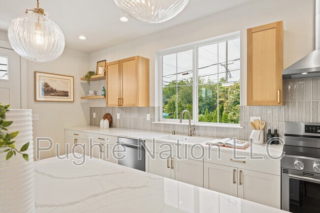 Building Photo - 4142 3rd Ave NW